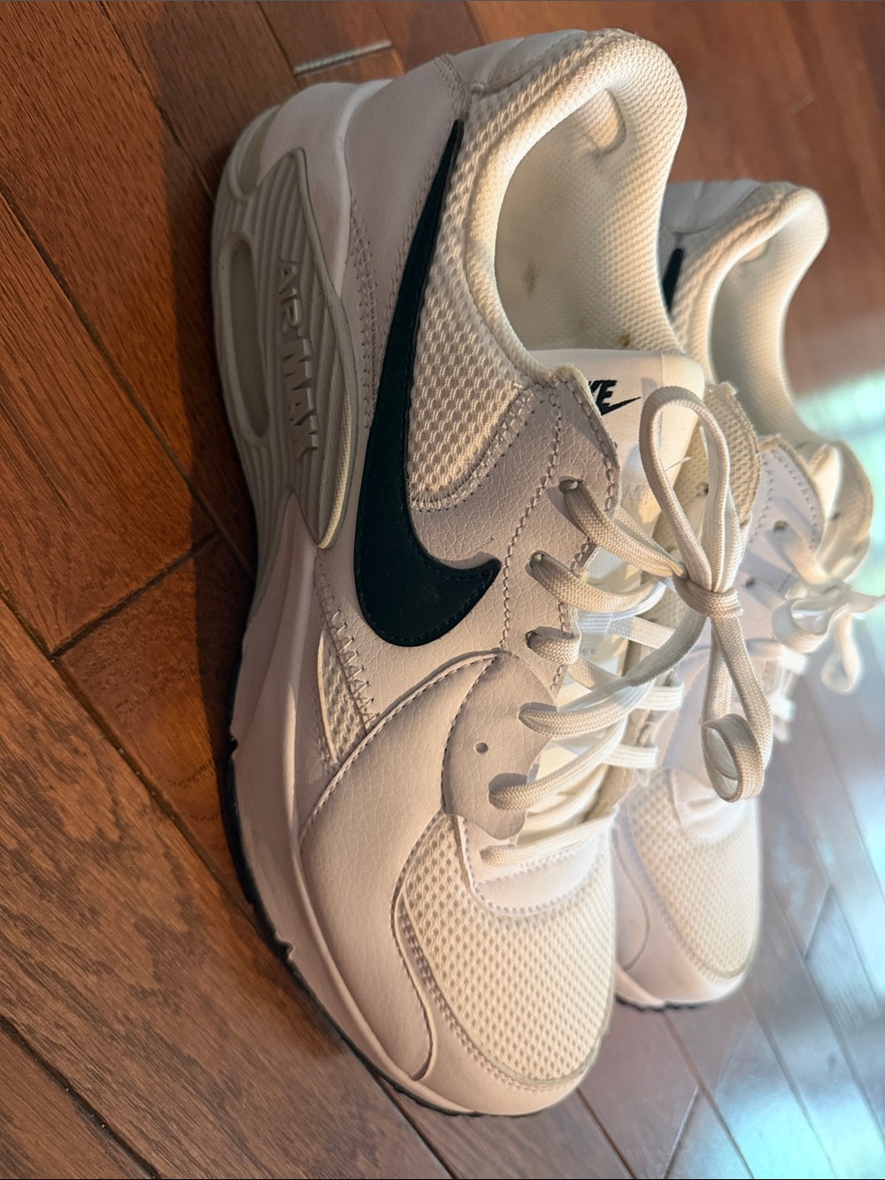 Nike Airmax Women's White Sneakers with Black Swoosh Accent